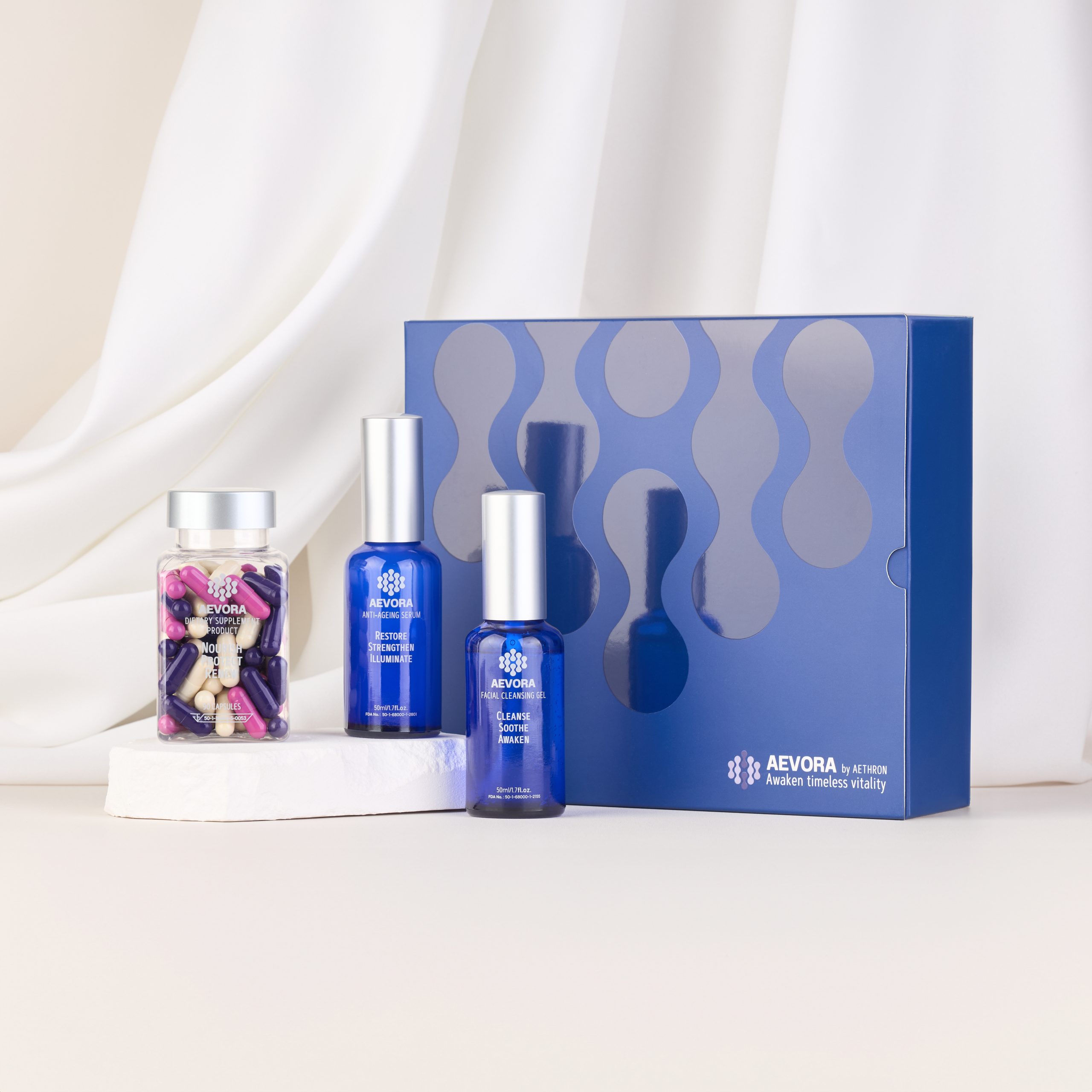 Aevora monthly renewal system by Aethron, featuring anti-ageing serum, facial cleansing gel, and dietary supplement capsules