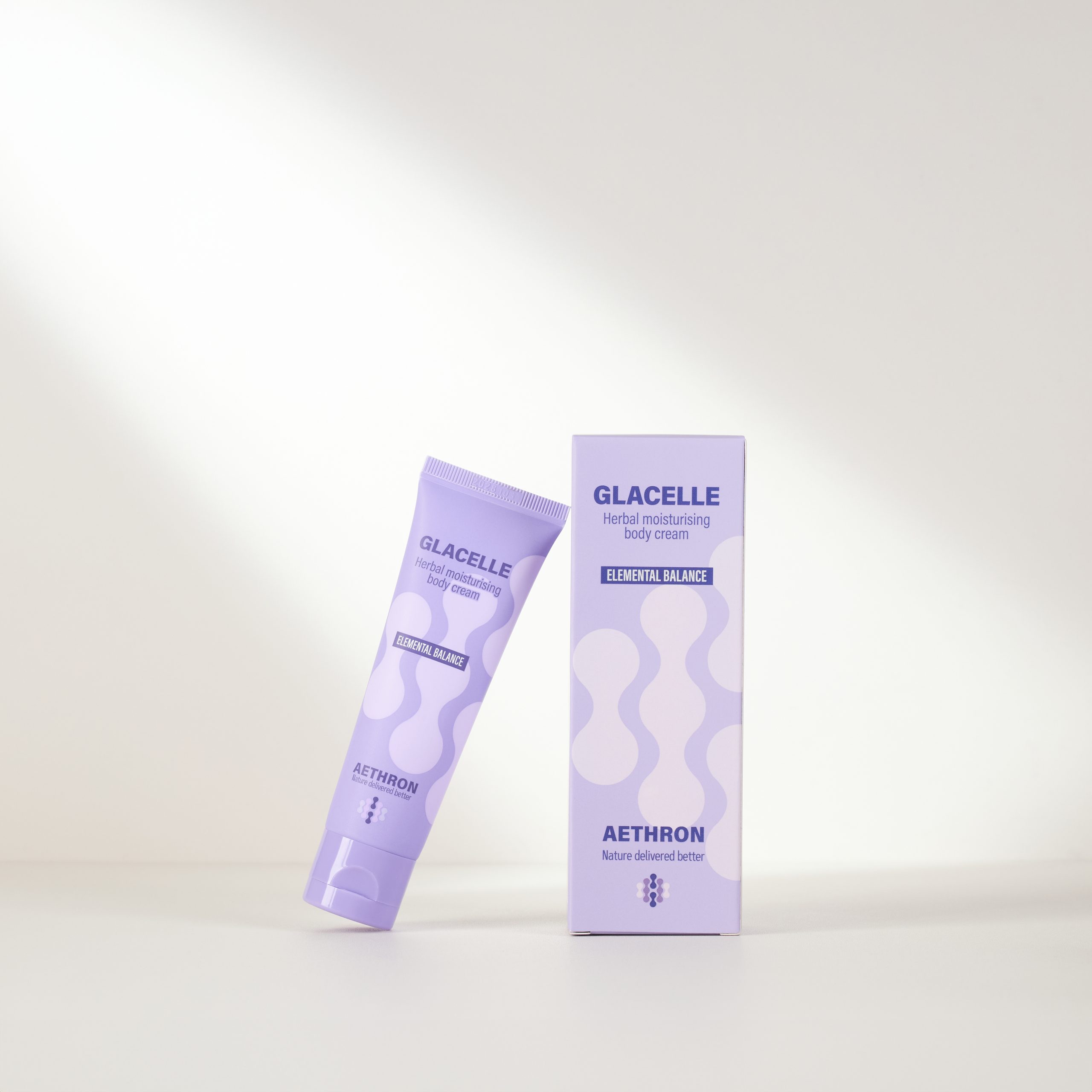 Glacelle cooling herbal moisturising body cream by Aethron, shown in tube and box packaging.